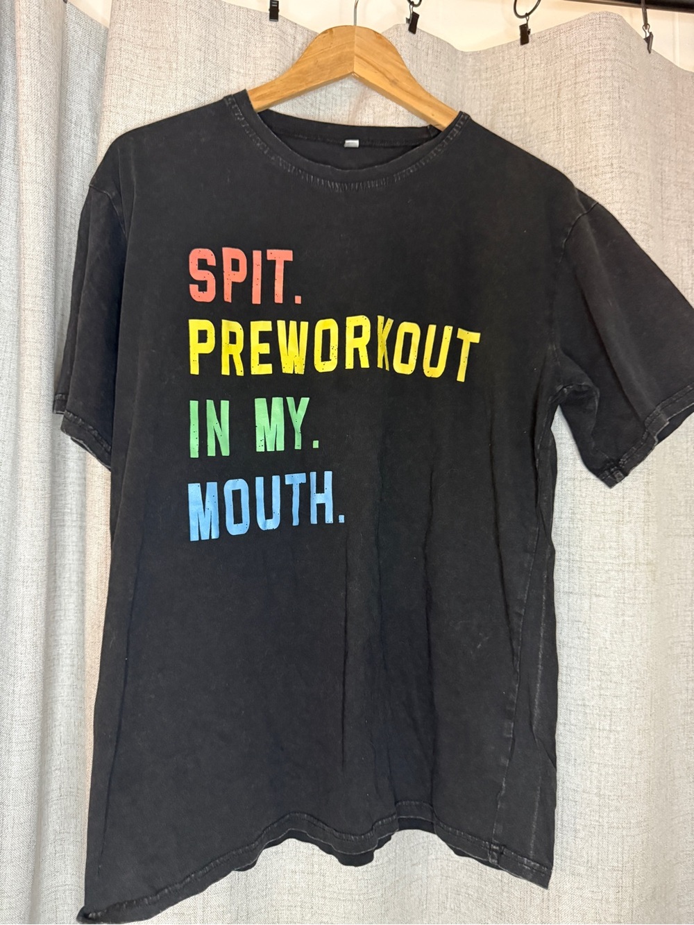 Black Short-Sleeve Graphic Tee with Multicolor Text